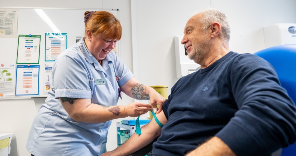 Male patient having his blood taken
